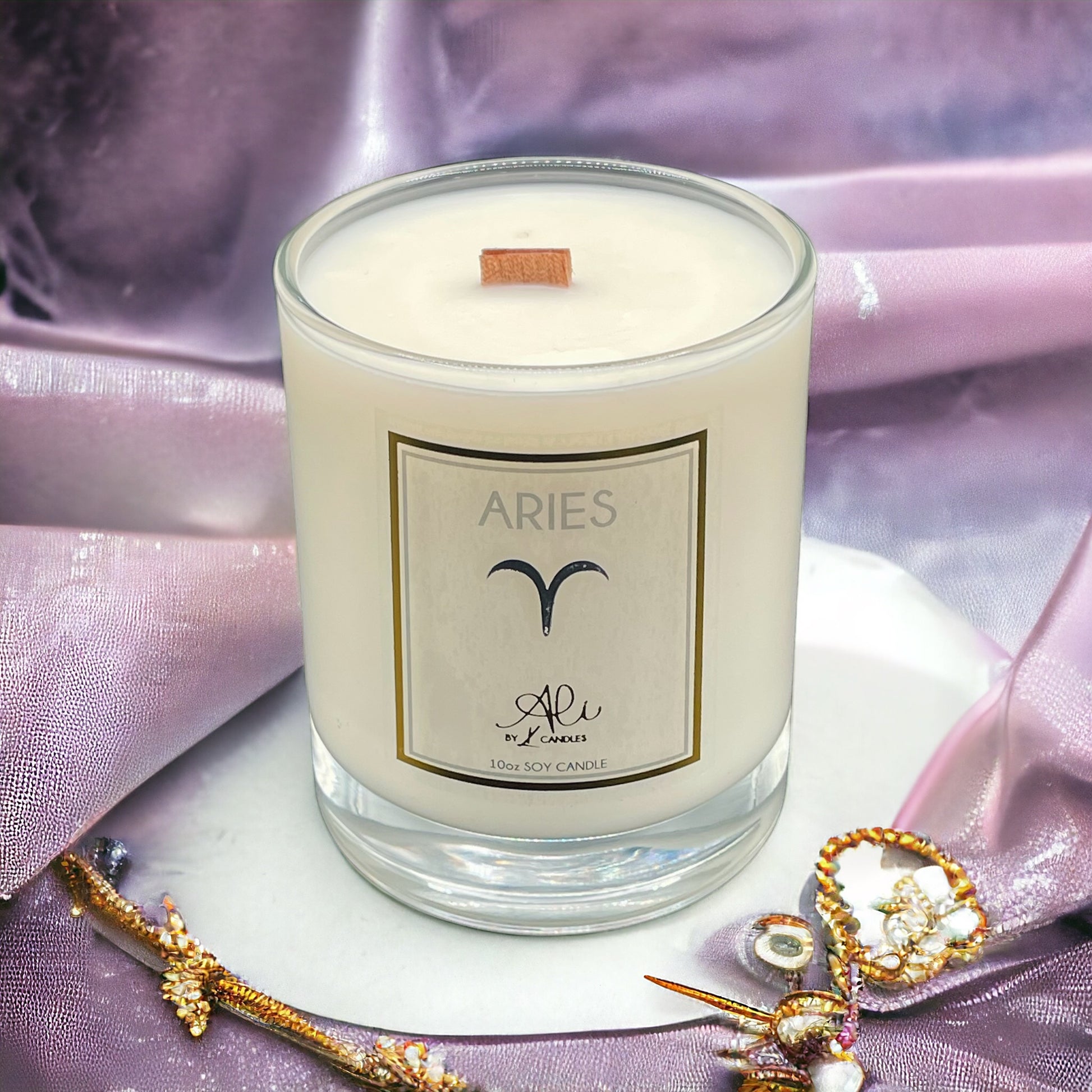 best selling birthday gift, aries woodwick candle on a luxurious table