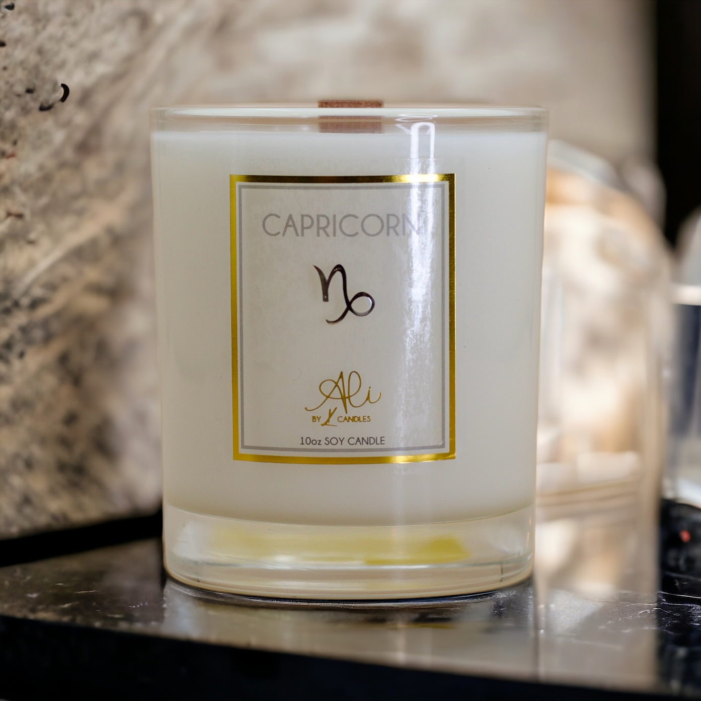 Capricorn zodiac scented soy candle with amber, sandalwood and citrus