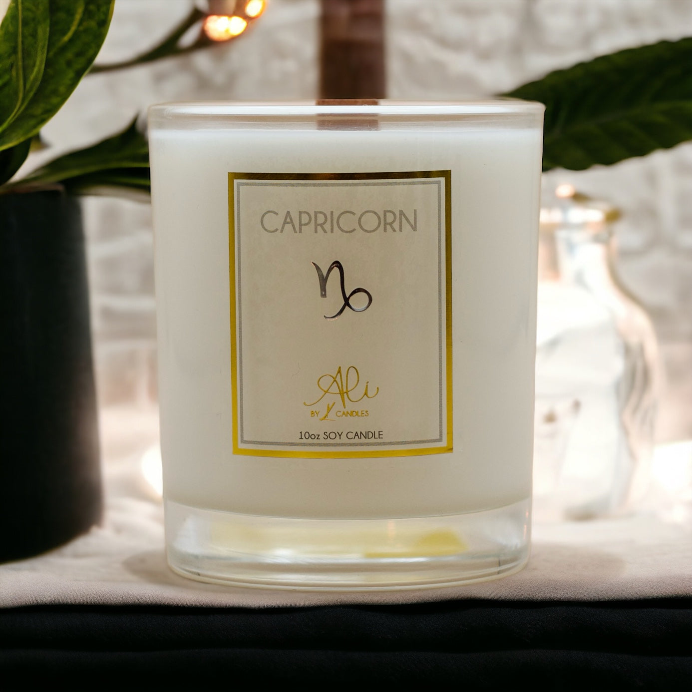 Capricorn zodiac scented soy candle with amber, sandalwood and citrus. karys layne candles