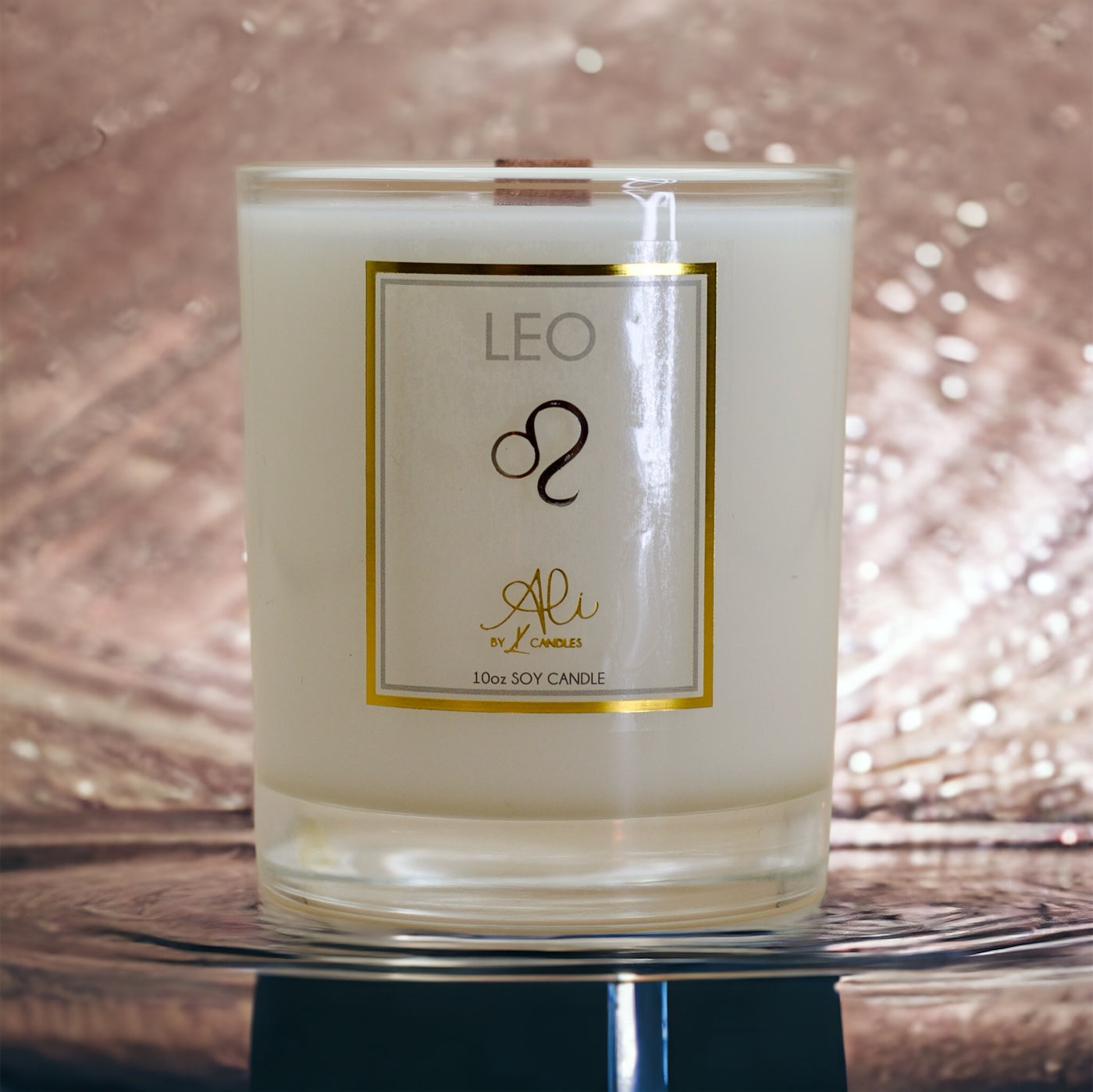leo zodiac candle unique gift on sparkle background