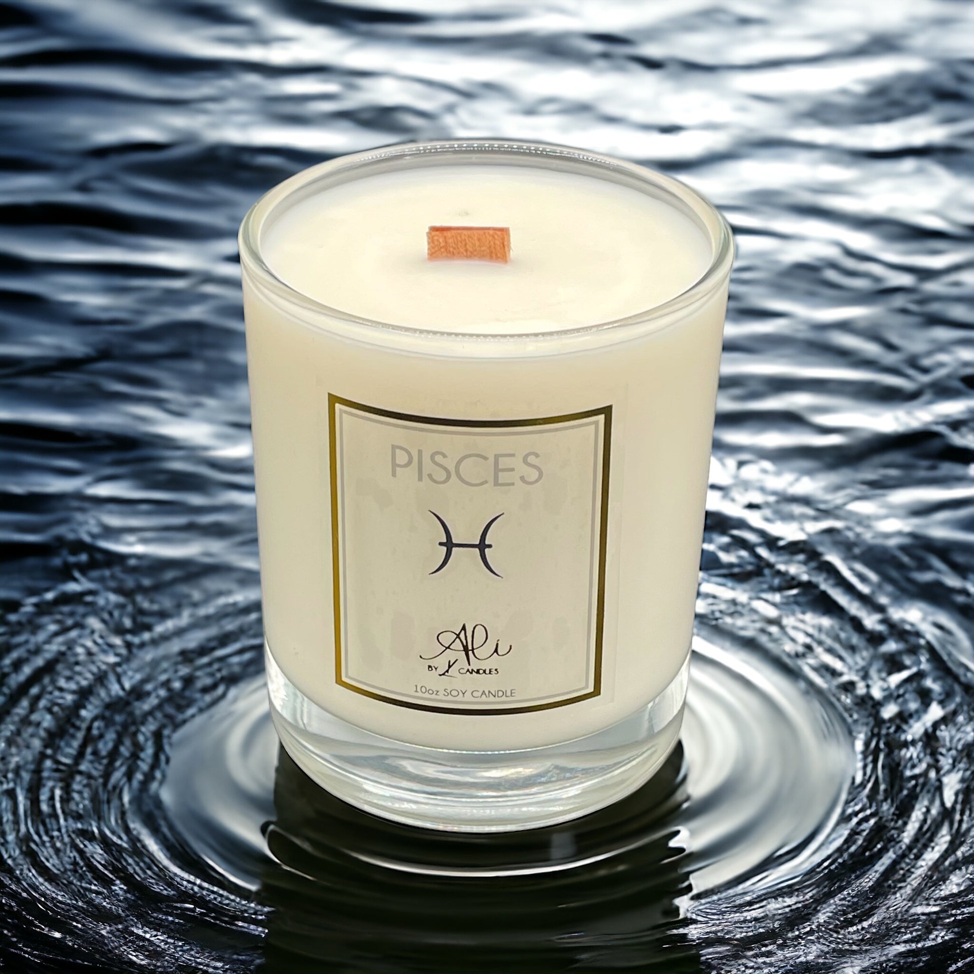 Pisces zodiac scented soy candle with amber, sandalwood and citrus. best selling candle