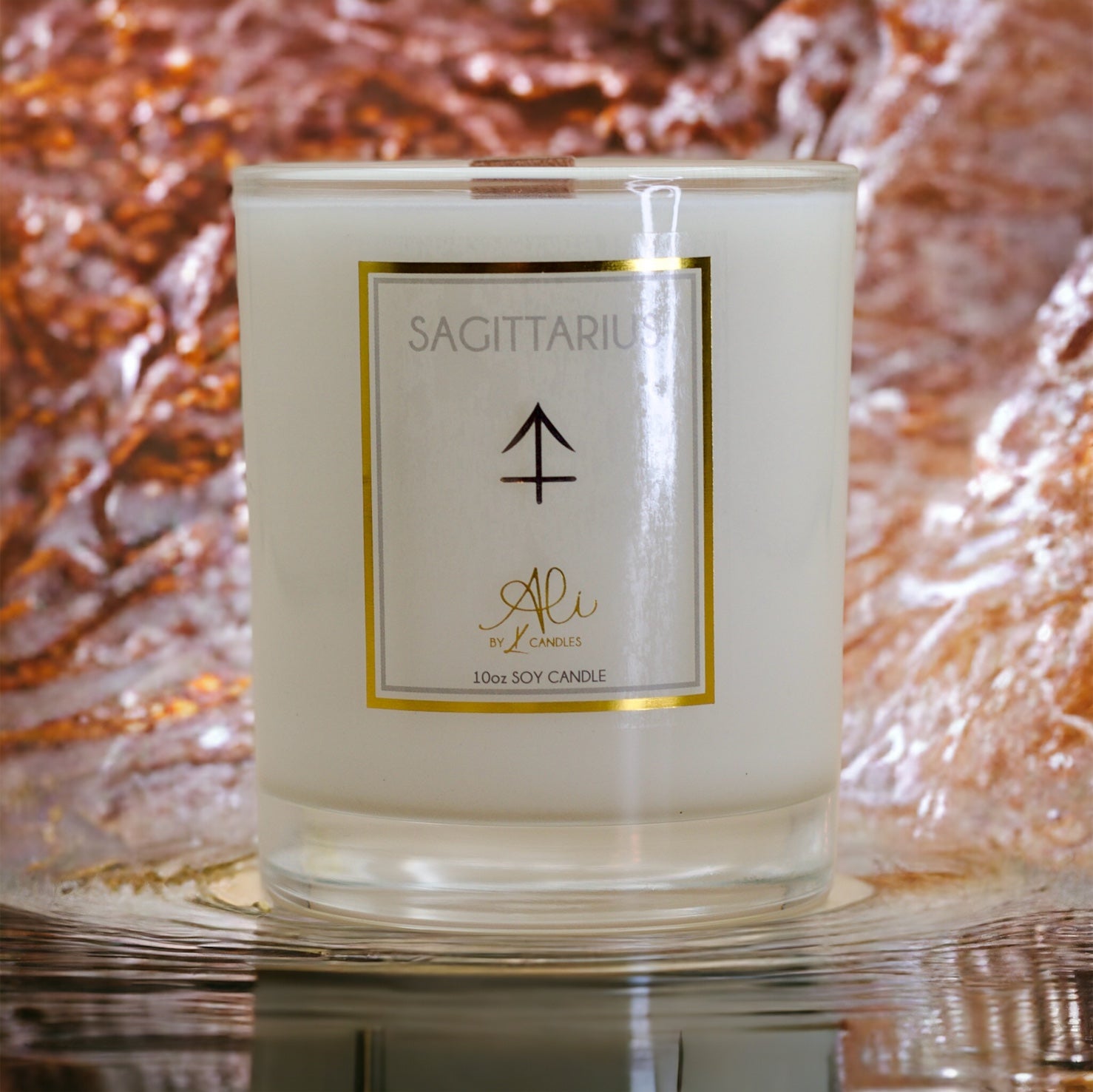 Sagittarius zodiac scented soy candle with amber, sandalwood and citrus
