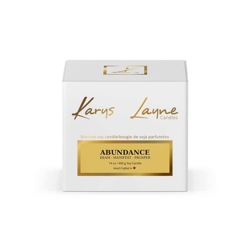 This scented candle is created with notes of cherries, cinnamon, and vanilla. Abundance Crystal Karys Layne Candle
