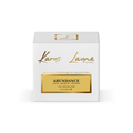 This scented candle is created with notes of cherries, cinnamon, and vanilla. Abundance Crystal Karys Layne Candle